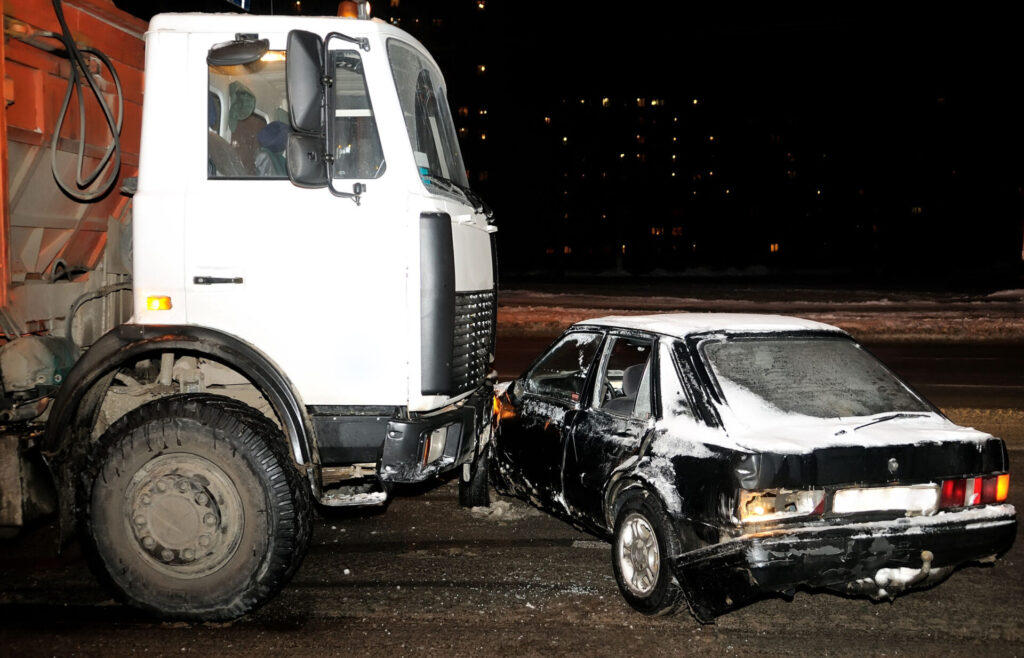 “Josh Maness Marshall truck accident lawyer offering legal advice to a client”